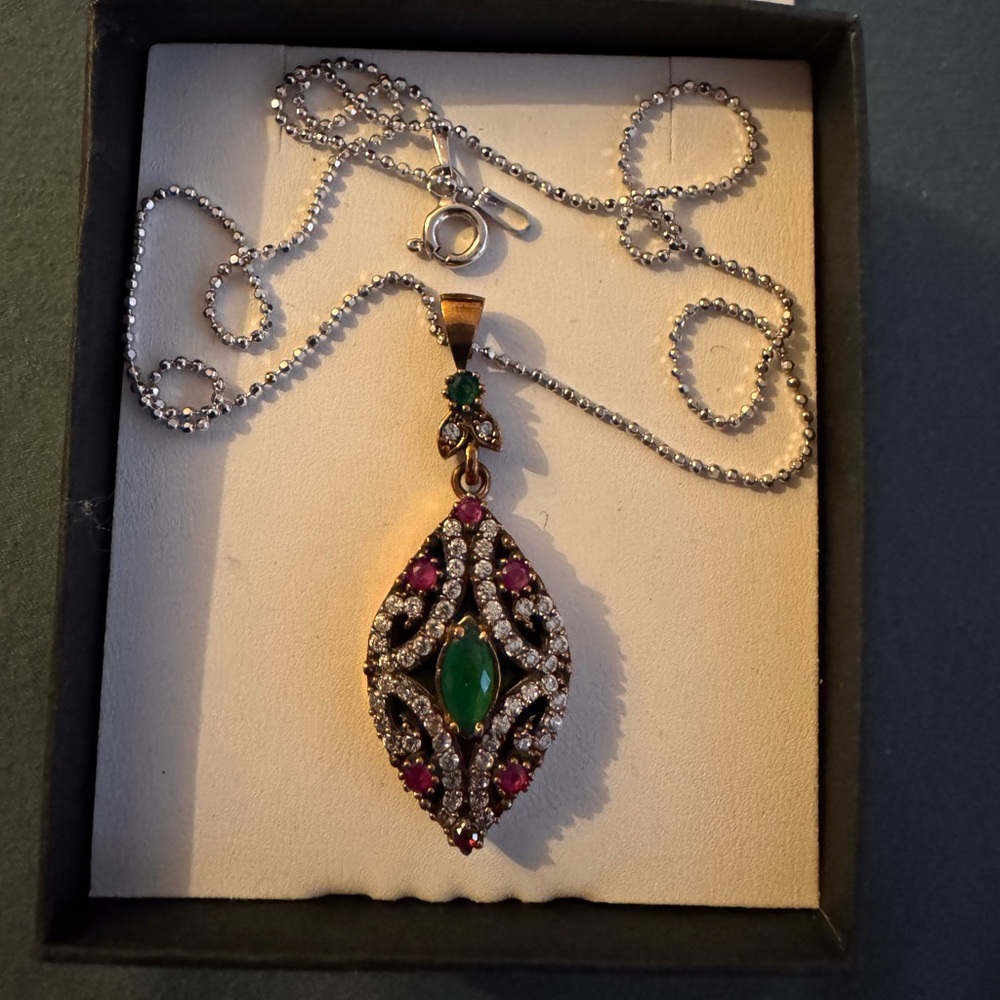 Elegant Silver and Gold Pendant Necklace